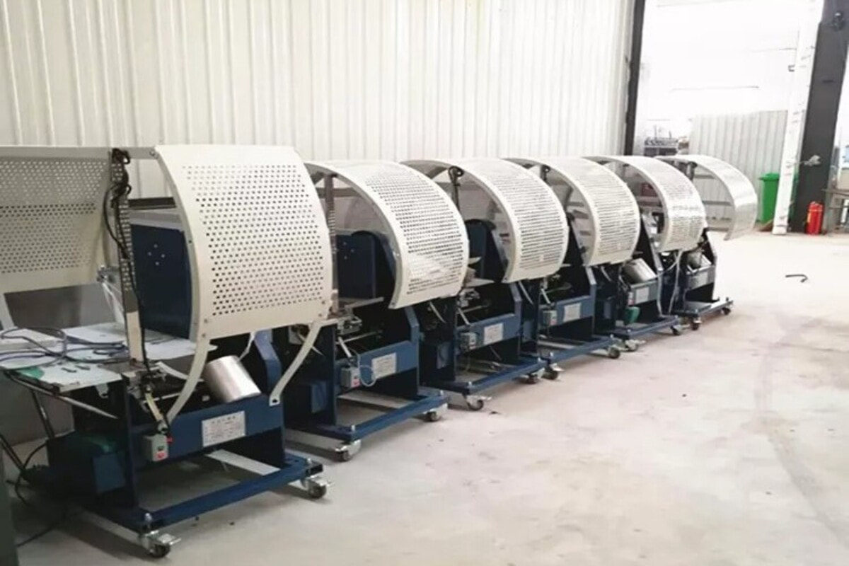 Máy cột dây thùng carton - Giải pháp đóng gói nhanh chóng